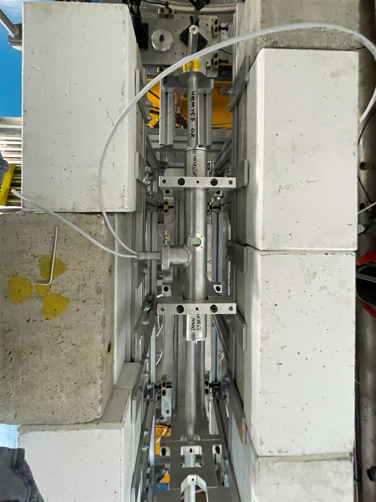 Meteorite sample mounted in the irradiation rig between shielding blocks