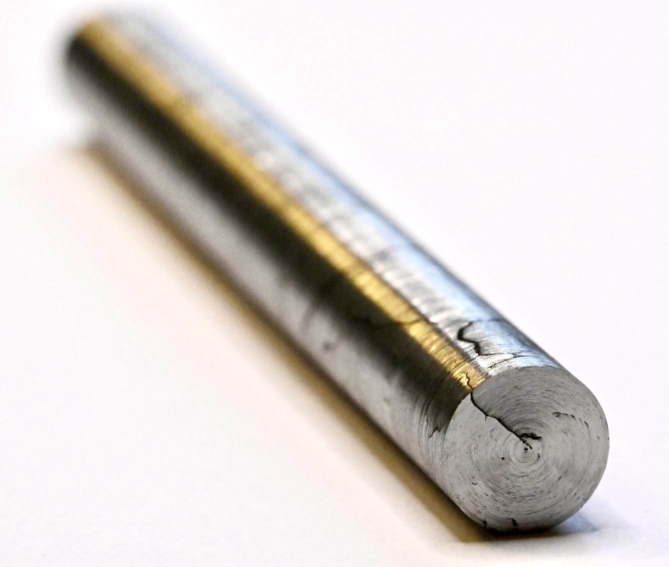 Machined cylindrical meteorite sample used for beam irradiation